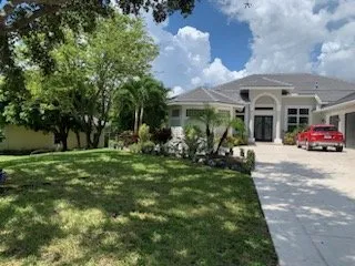 Professional residential landscaping for beautiful yards in Stuart, FL by Evergreen Lawncare and Maintenance