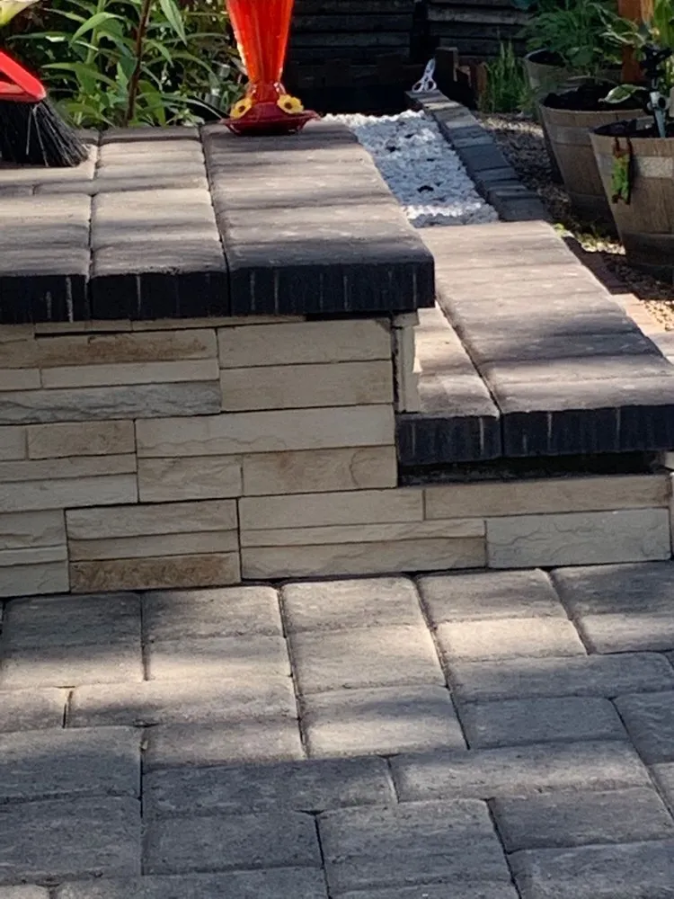 Custom residential landscaping for year-round maintenance in Spanaway, WA by Ever's Pavers