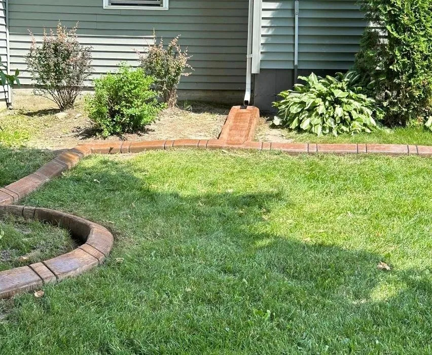 Local outdoor landscaping with custom design across Bangor, NY - Every Day's Saturday Curbing