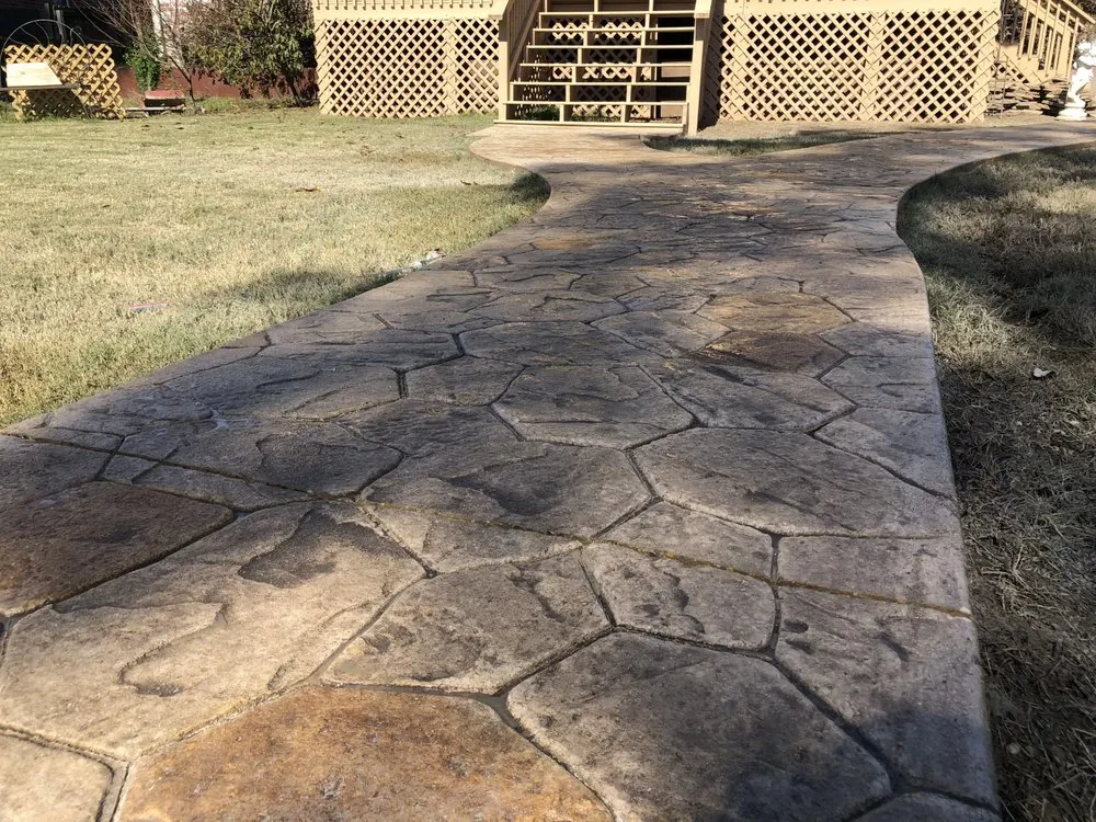 Custom lawn mowing service for beautiful yards in Little Rock, AR by Evolution Concrete