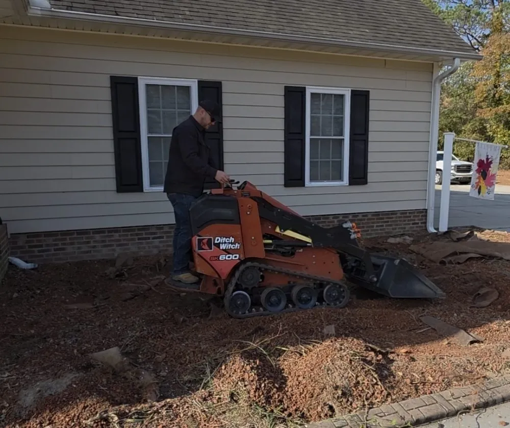 Custom residential landscaping for year-round maintenance in Bunnlevel, NC by Evolution Landscape Solutions
