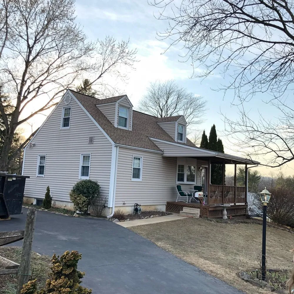 Custom lawn mowing service for residential properties across Liverpool, NY - Excellent Lawn Landscaping and Construction