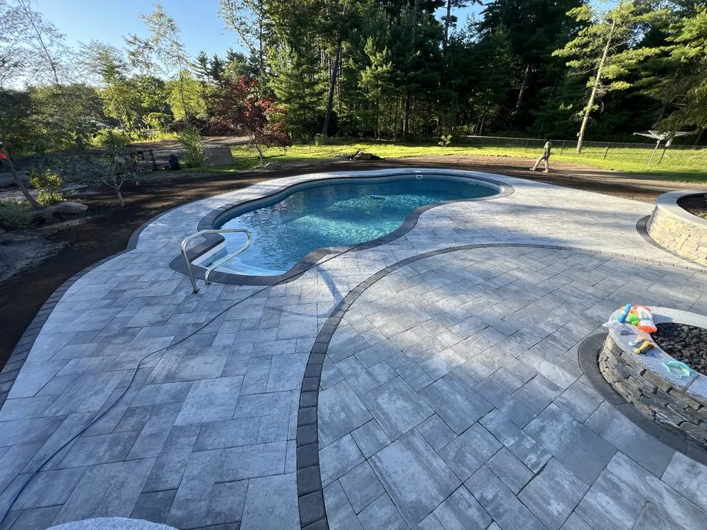 Top-rated lawn care service with custom design in Abington, MA by Exclusive Hardscapes