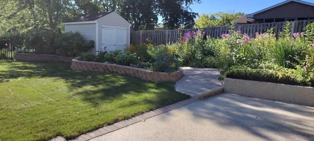 Trusted lawn mowing service in Peoria, IL by Exclusive landscaping.inc