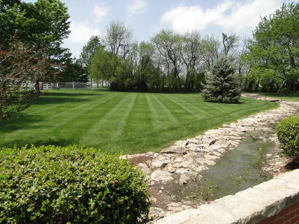 Professional landscape installation experts serving Lees Summit, MO - Exclusive Lawns