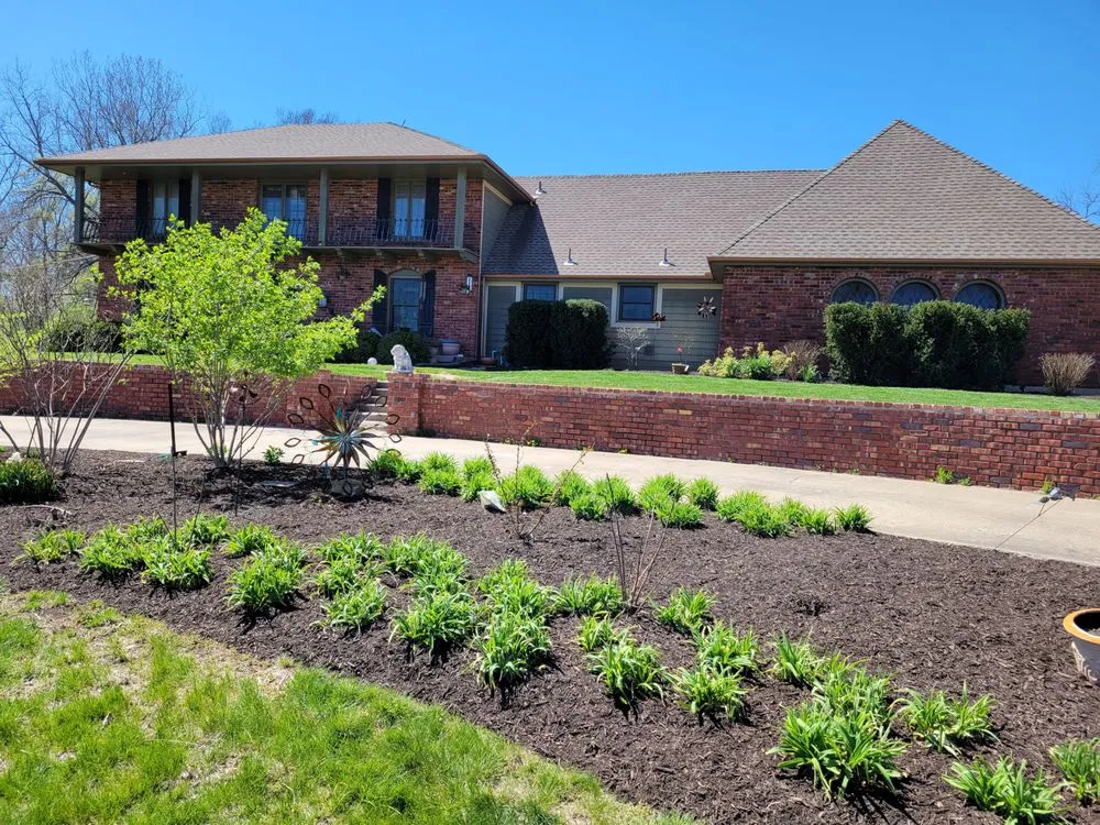 Trusted yard cleanup service with custom design in Olathe, KS by Expanding Horizons Landscaping