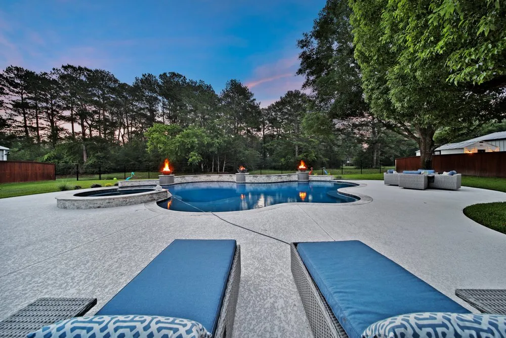 Expert lawn mowing service in Cypress, TX by Expression Custom Pools