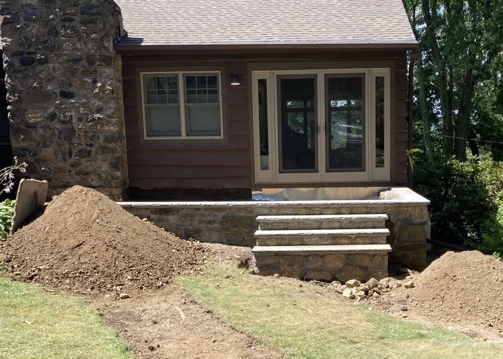 Custom landscape installation in Danbury, CT - Exterior Services