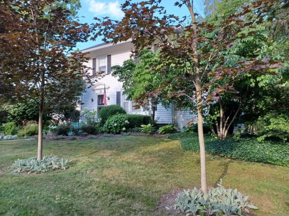 Reliable landscaping services for homes across Hamburg, NY - Extraordinaire Landscape and Lawn Care