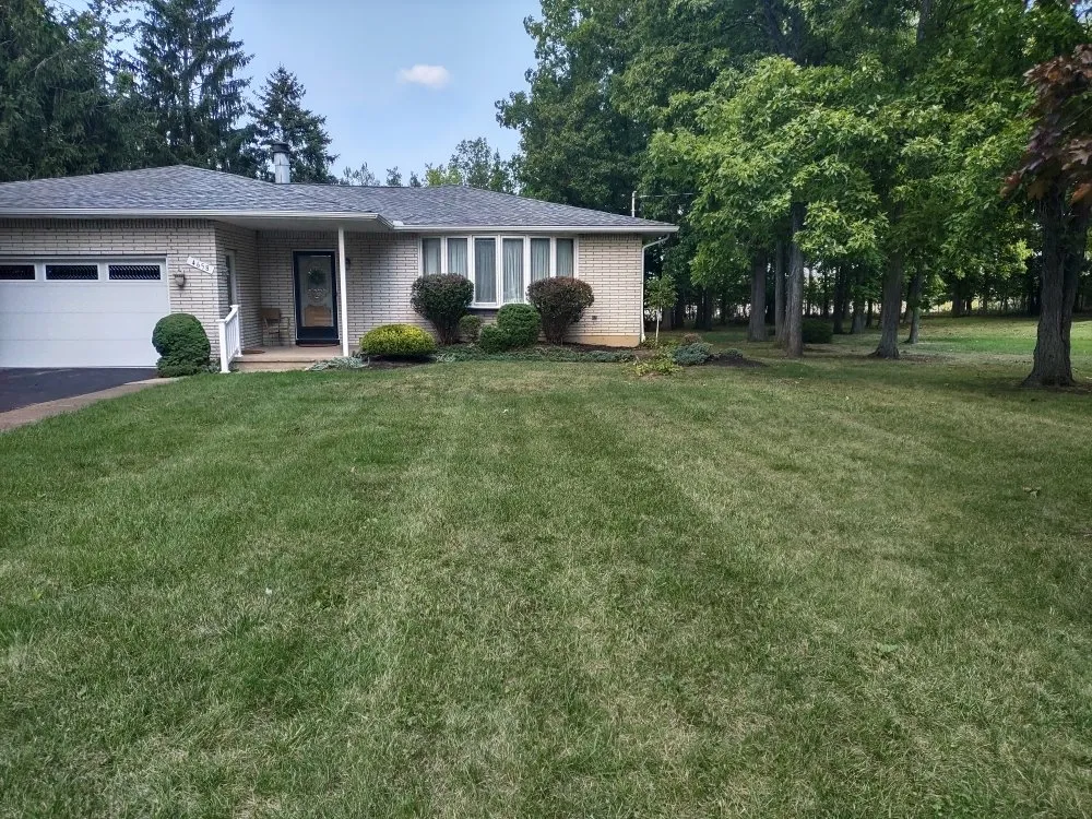 Affordable garden landscaping with custom design in Hamburg, NY by Extraordinaire Landscape and Lawn Care