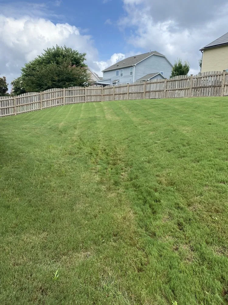 Custom lawn mowing service for homes in Rolesville, NC by EZ-Aeration