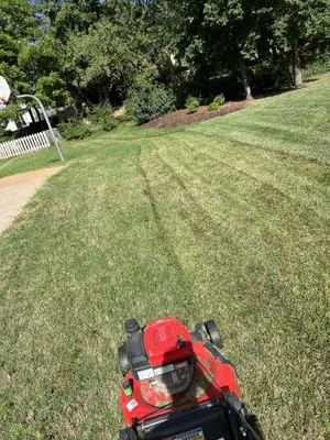 Ez As That Mowing Logo