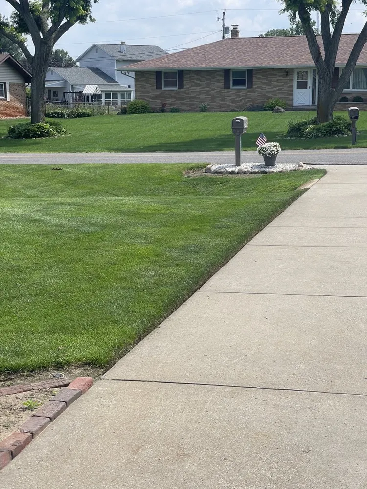 Professional landscape installation with custom design in South Bend, IN by Ez Cut & Plow By Jimana