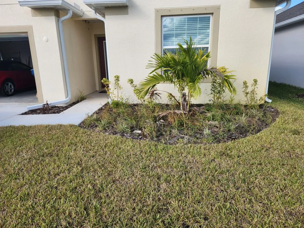 Top-rated landscape design for homes in Palm Bay, FL by EZ does it lawn care