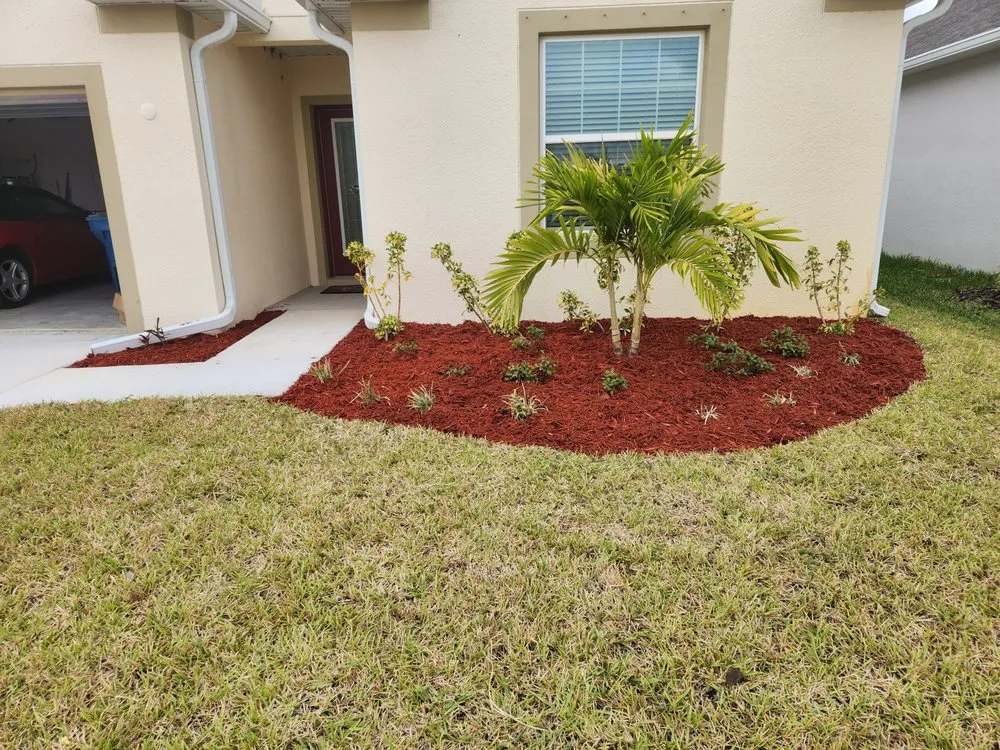 Affordable landscaping services for residential properties in Palm Bay, FL by EZ does it lawn care