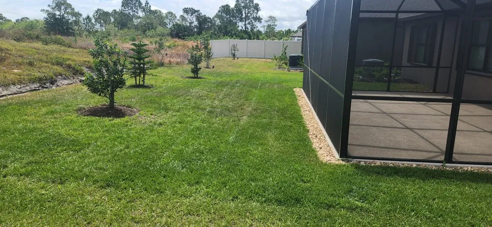 Top-rated landscaping services experts serving Palm Bay, FL - EZ does it lawn care