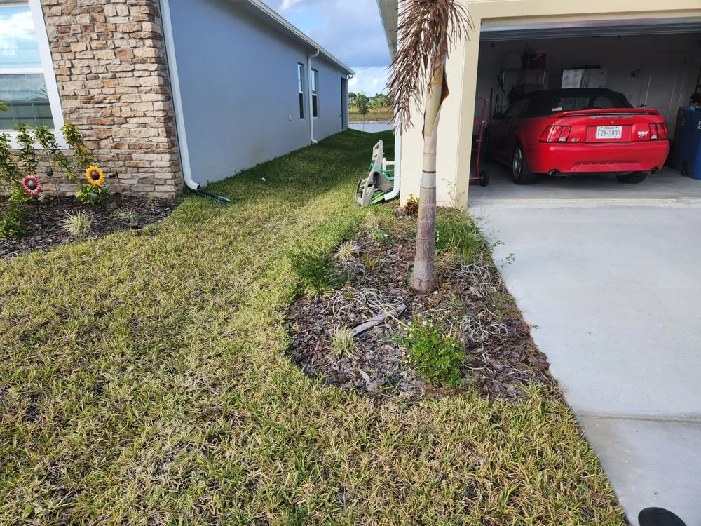 Local residential landscaping in Palm Bay, FL by EZ does it lawn care
