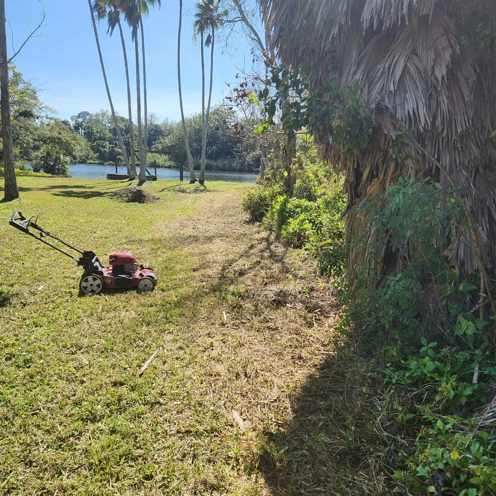 Expert lawn mowing service in Palm Bay, FL - EZ does it lawn care