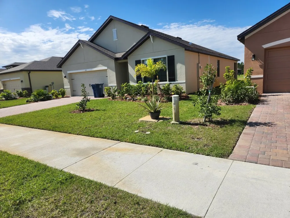 Professional lawn care service in Palm Bay, FL by EZ does it lawn care