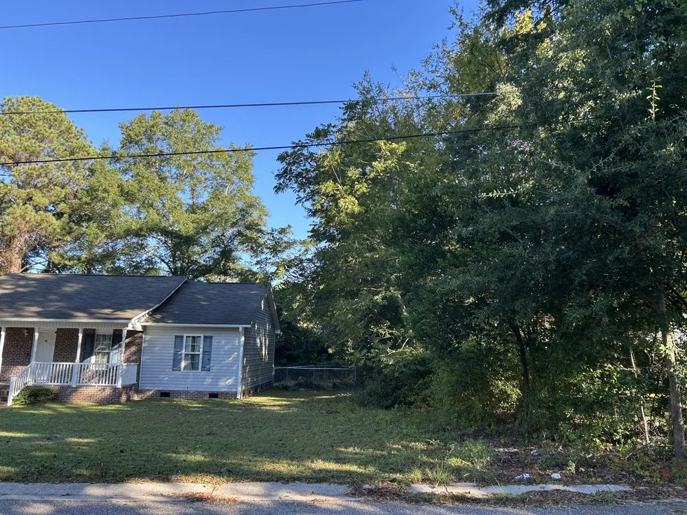 Expert yard maintenance for homes in Holly Springs, NC by EZ Land Management & Grading