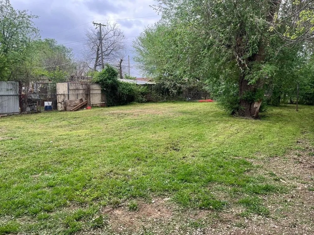 Affordable lawn mowing service in Oklahoma City, OK by EZ Landscaping