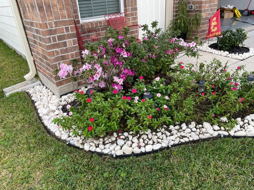 Custom outdoor landscaping for year-round maintenance in Houston, TX by EZ Lawn Care and Landscaping