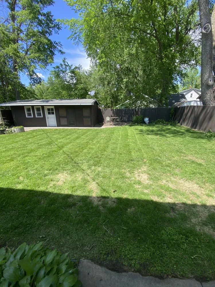 Affordable yard maintenance for beautiful yards in Faribault, MN by EZ Lawn Services