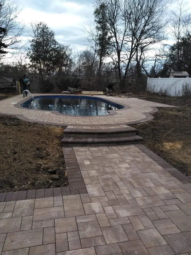 Top-rated lawn care service in Ronkonkoma, NY by EZ Mason and Concrete