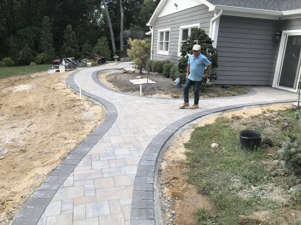 Professional lawn mowing service experts serving Ronkonkoma, NY - EZ Mason and Concrete