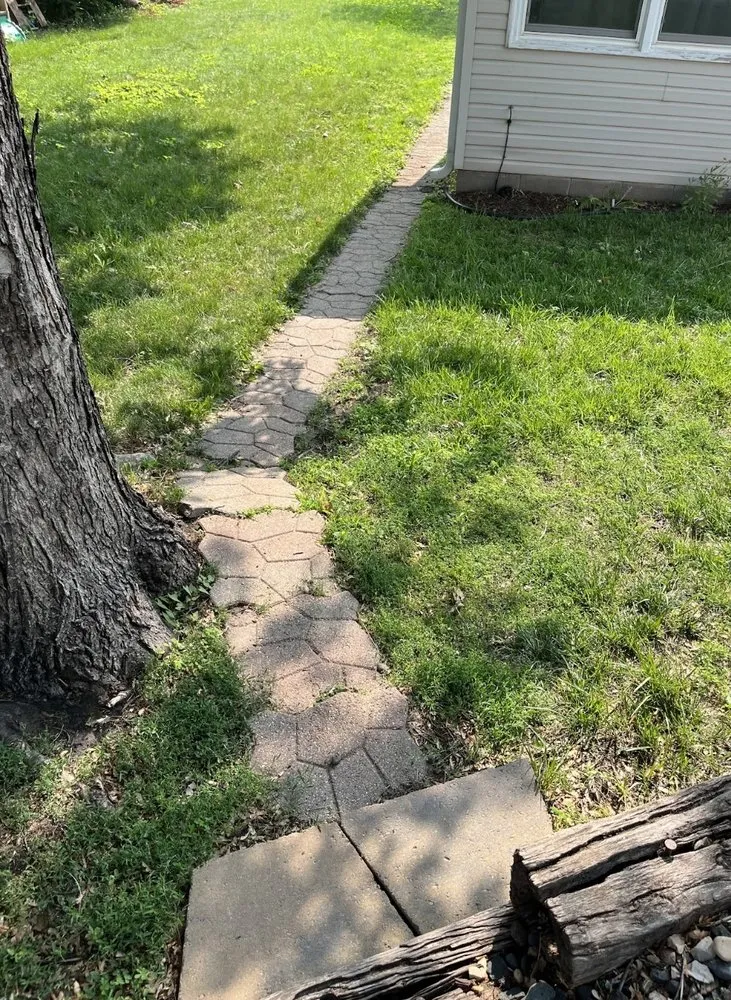 Expert lawn care service experts serving Minneapolis, MN - EZ Outdoor Services