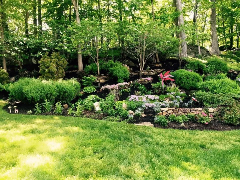 Custom yard cleanup service for year-round maintenance across Carmel Hamlet, NY - F & R Landscaping