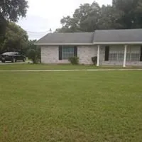 Professional landscape installation for residential properties in Lakeland, FL by Faircloth Maintenance Services