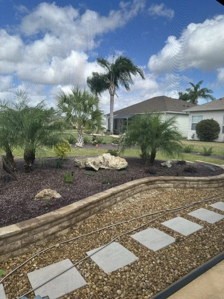Professional yard maintenance for year-round maintenance in Oxford, FL by Fairfield Farms