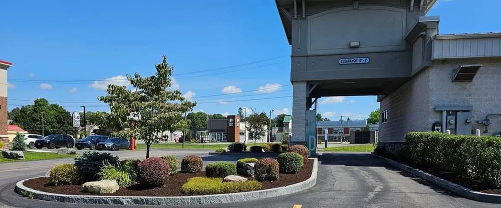 Professional lawn mowing service with custom design across Oswego, NY - Fairy Lawnmother