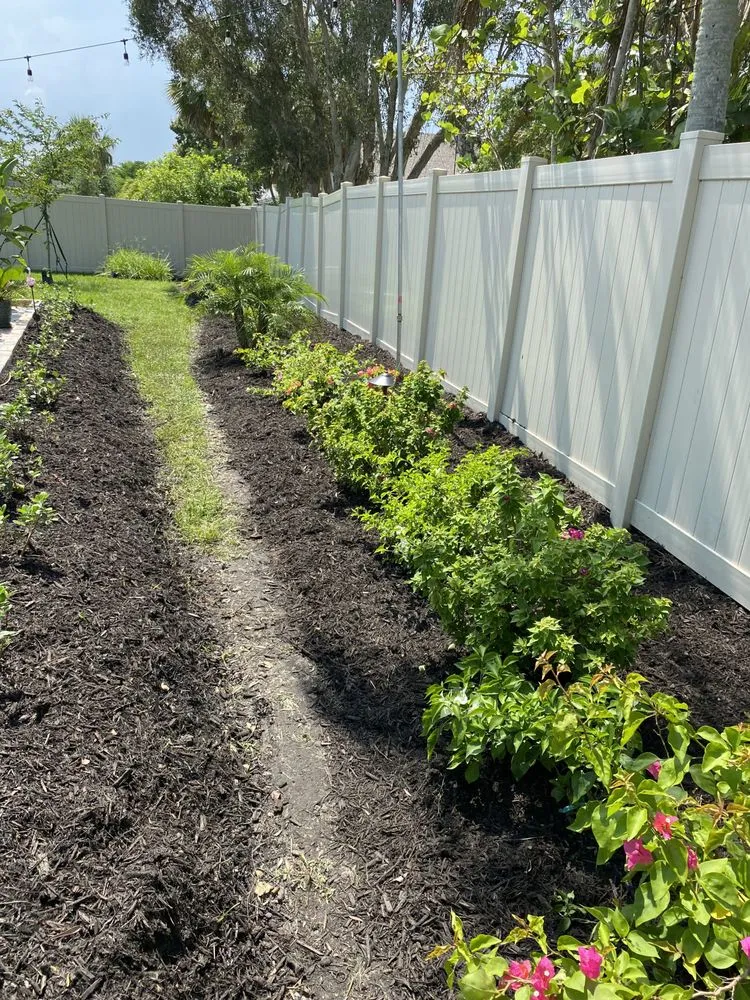 Custom landscape design in Palm Bay, FL by Faithful Lawn Service