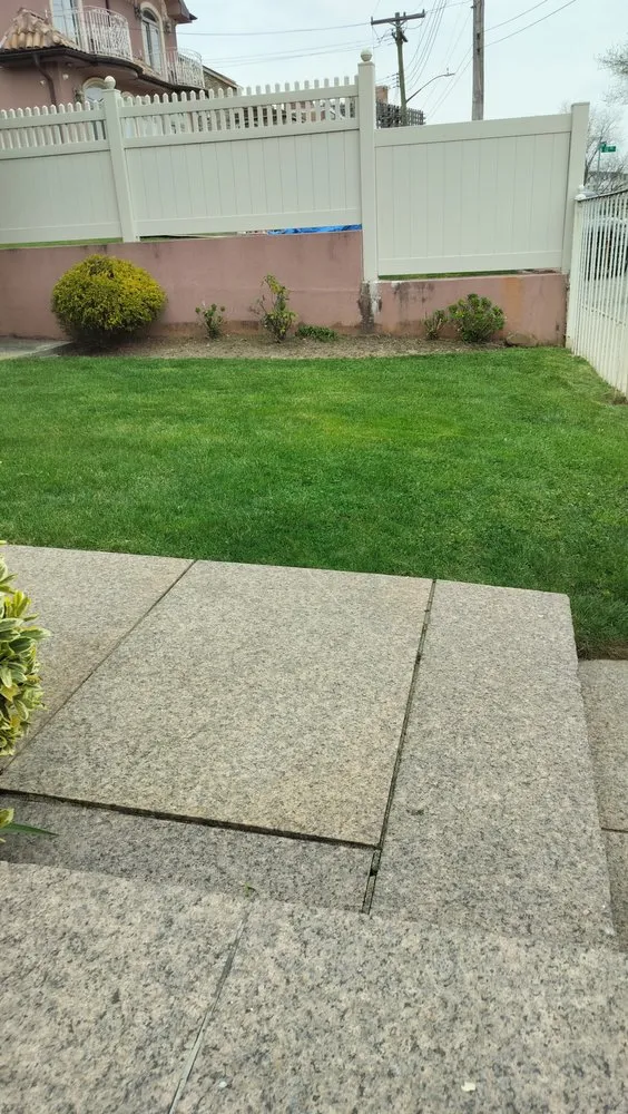 Affordable lawn mowing service for homes in Flushing, NY by Fajugica Landscaping