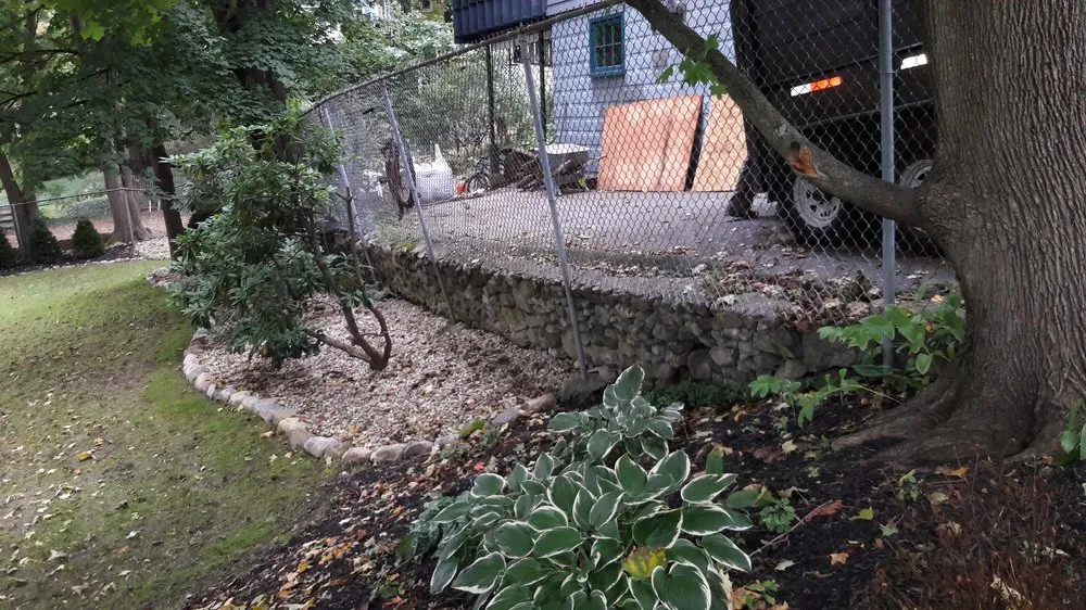 Reliable yard cleanup service for year-round maintenance in Lynn, MA by F.A.L. Construction & Landscaping