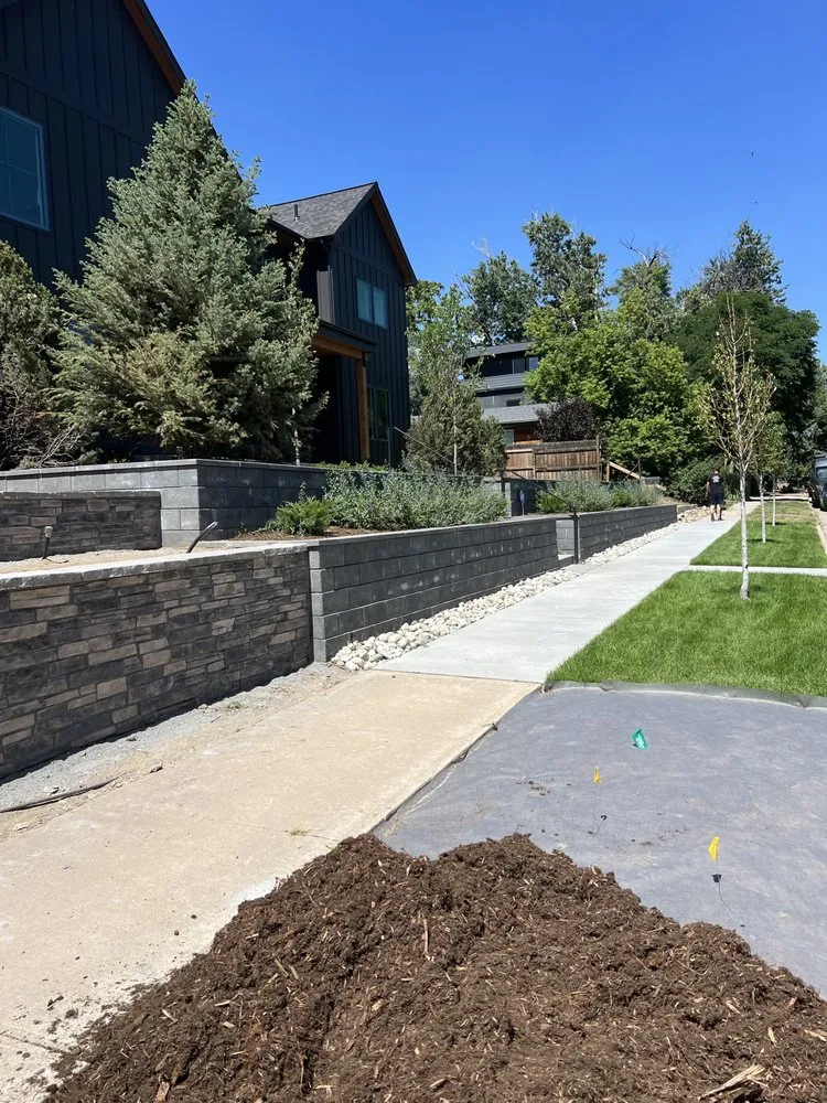 Professional lawn mowing service for year-round maintenance across Aurora, CO - Falcon Design’s