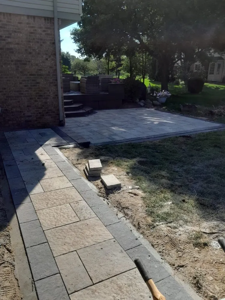 Professional lawn mowing service with custom design across Shelby Township, MI - Falcon Lawn Care & Patio Services