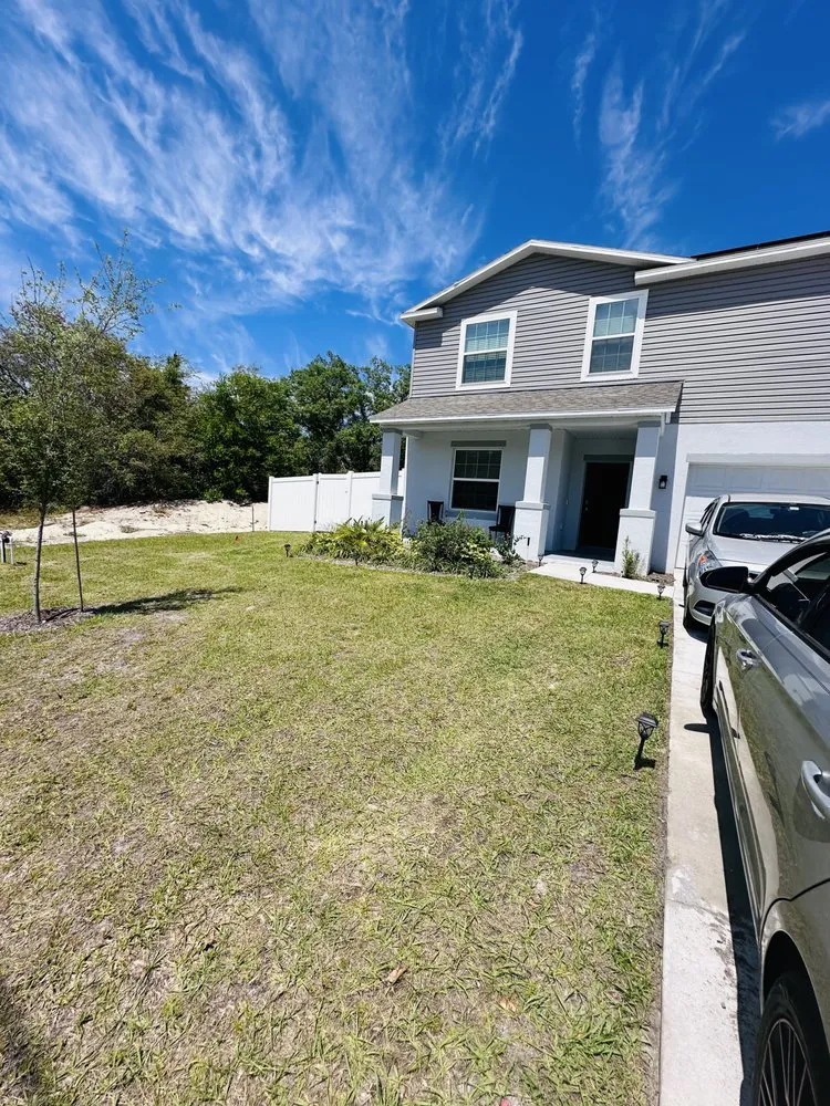 Local yard cleanup service for homes in Kissimmee, FL by Family Lawn Care