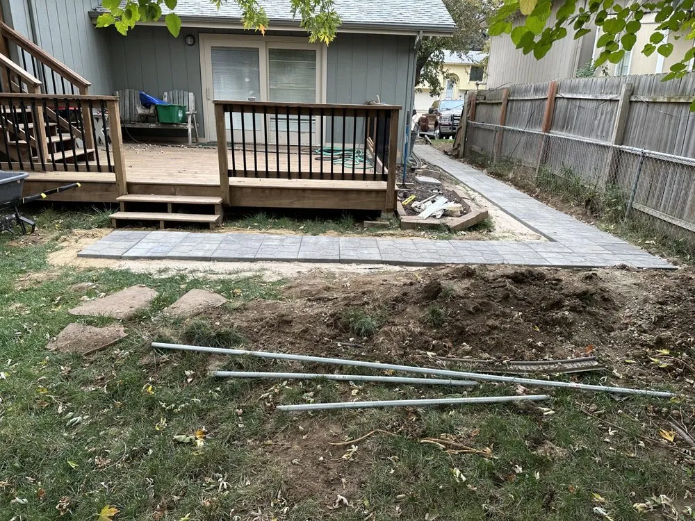 Affordable landscape installation with custom design in Omaha, NE by Family Roots Lawn Care and Landscaping