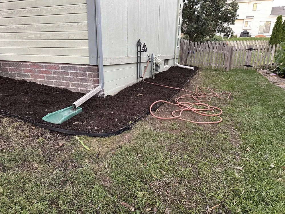 Custom garden landscaping with custom design across Omaha, NE - Family Roots Lawn Care and Landscaping