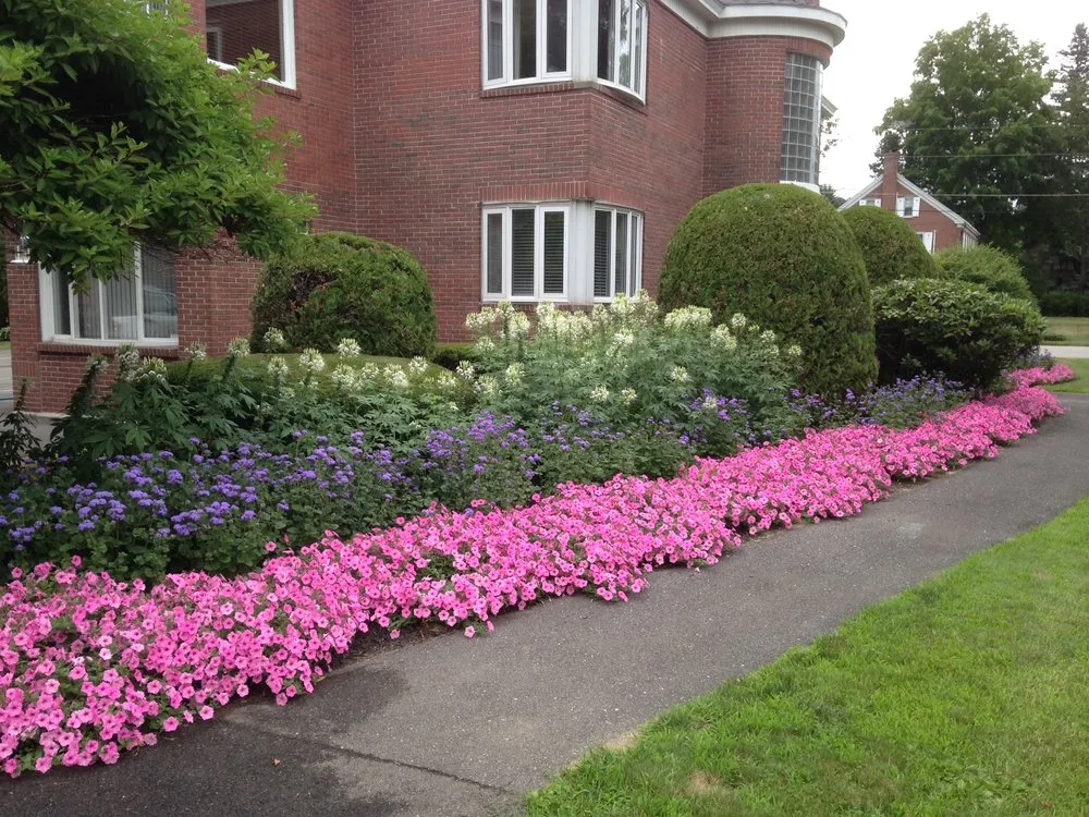 Custom residential landscaping for year-round maintenance across Sidney, ME - Family Tree Lawn & Landscape Management