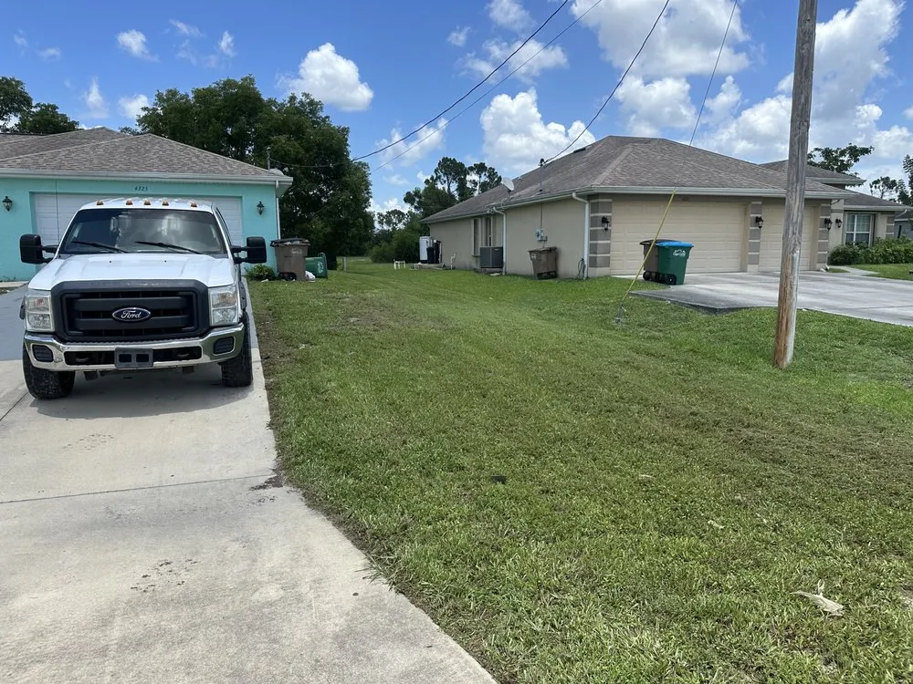 Professional lawn mowing service with custom design in Fort Myers, FL by Fanck’s Services