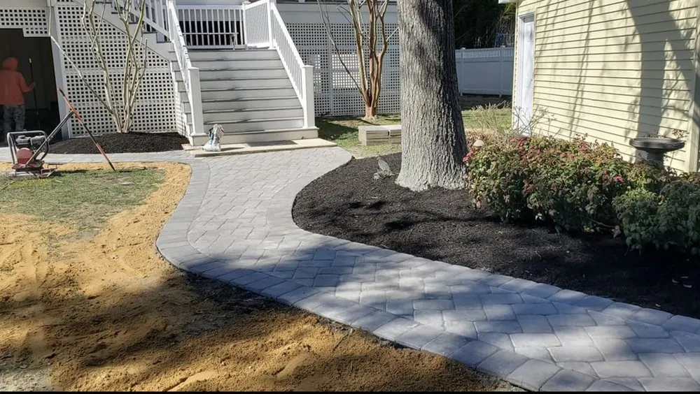 Professional lawn care service with custom design across Harbeson, DE - Fare Green Landscaping