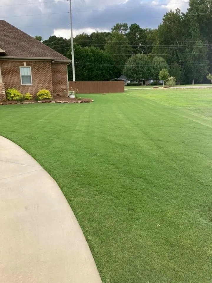 Custom outdoor landscaping for residential properties in Ashville, AL by Farley Pressure and Softwashing