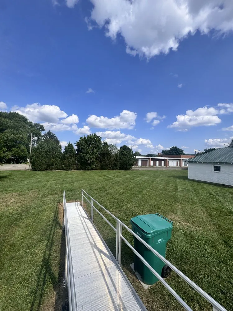 Local lawn mowing service with custom design in Zanesville, OH by Farmer Tae Landscaping