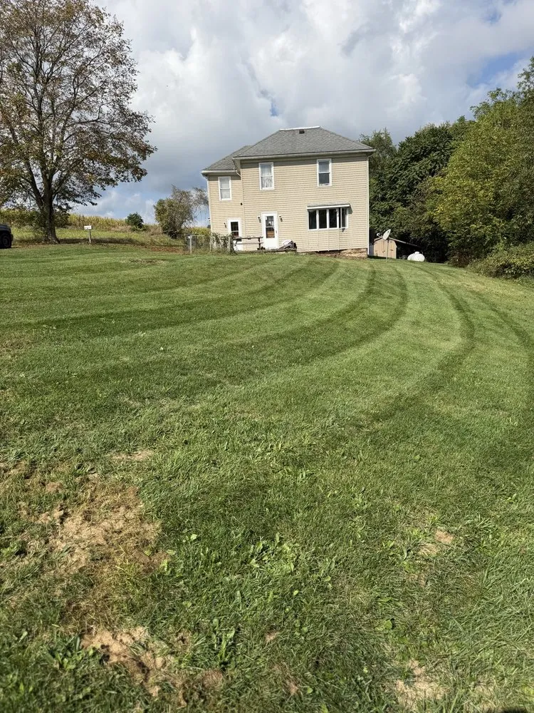 Top-rated yard cleanup service for year-round maintenance across Zanesville, OH - Farmer Tae Landscaping