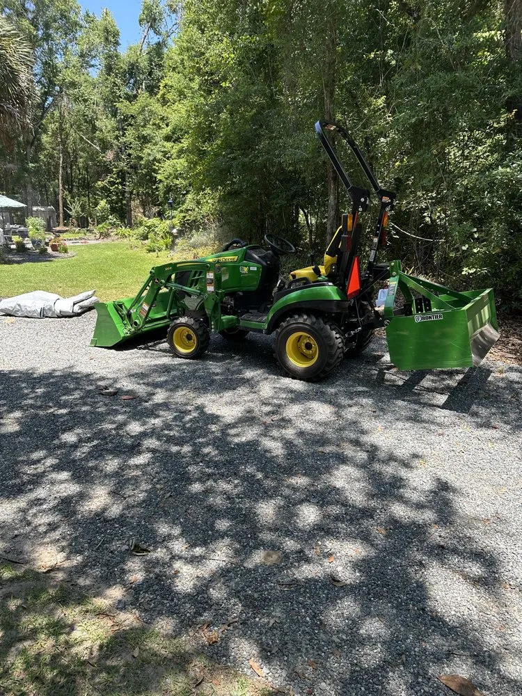 Professional yard cleanup service in Tallahassee, FL by Farrar’s Tractor and Outdoor Services