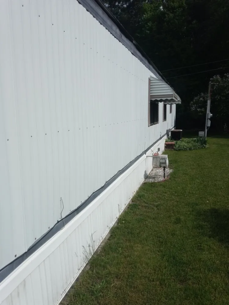 Reliable lawn mowing service for homes in Flint, MI by Fast N EZ Lawncare & Cleaning